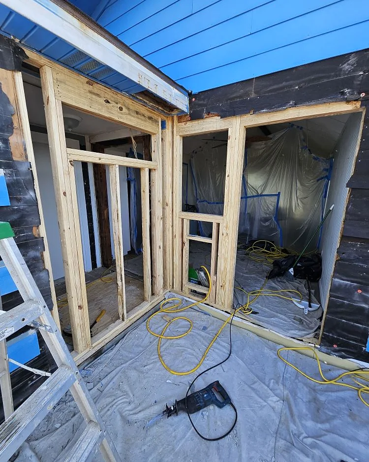 Interior framing and floor protection during a coastal home addition